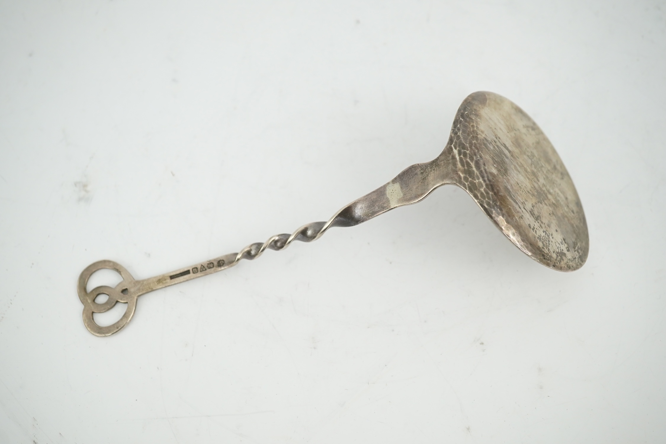 A George V Keswick School of Industrial Arts silver serving spoon, Chester, 1929, 17.5cm. Condition - fair